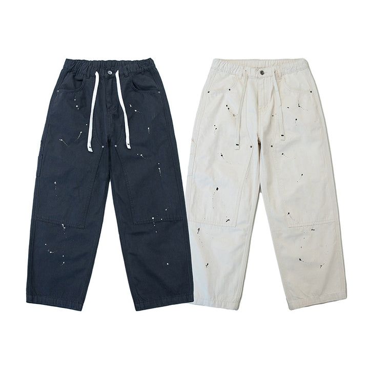 Unisex Weite Canvas-Hose mit elastischem Bund, Tunnelzug und Paint‑Splatter‑Details Echoarchiv