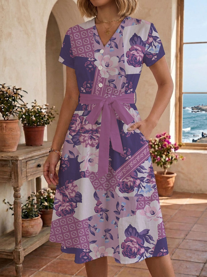Damen Sommerliches Kleid mit taillierbarem Bindegürtel und floralem Muster Echo Archiv