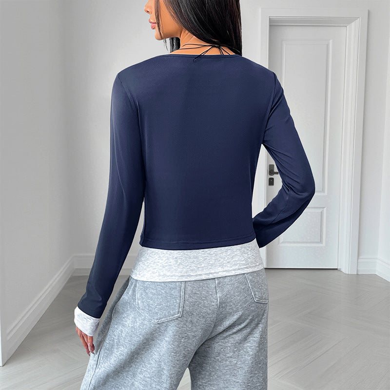 Damen Langärmeliges Crop-Shirt mit Henley-Knopfleiste, Figurbetonter Stretch-Passform und Daumenloch Echoarchiv