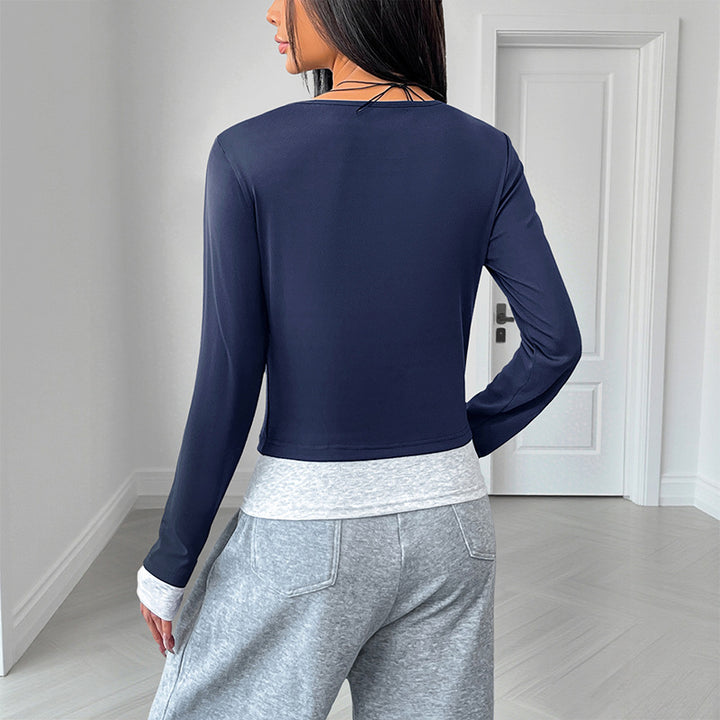 Damen Langärmeliges Crop-Shirt mit Henley-Knopfleiste, Figurbetonter Stretch-Passform und Daumenloch Echoarchiv