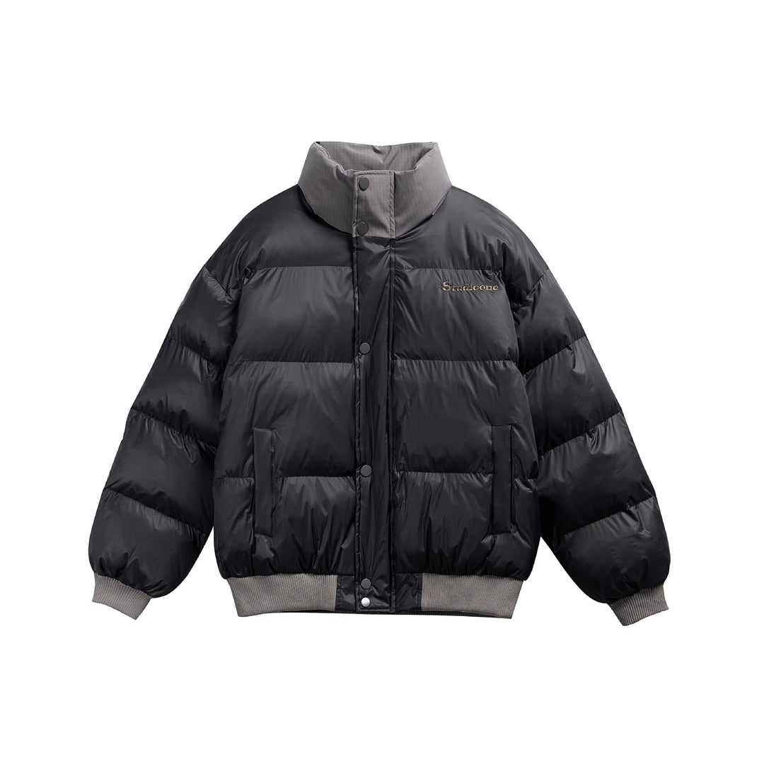 Unisex Kurz geschnittener ultraleichter Daunenoptik‑Puffer mit hohem Stehkragen und Rippbund Echoarchiv