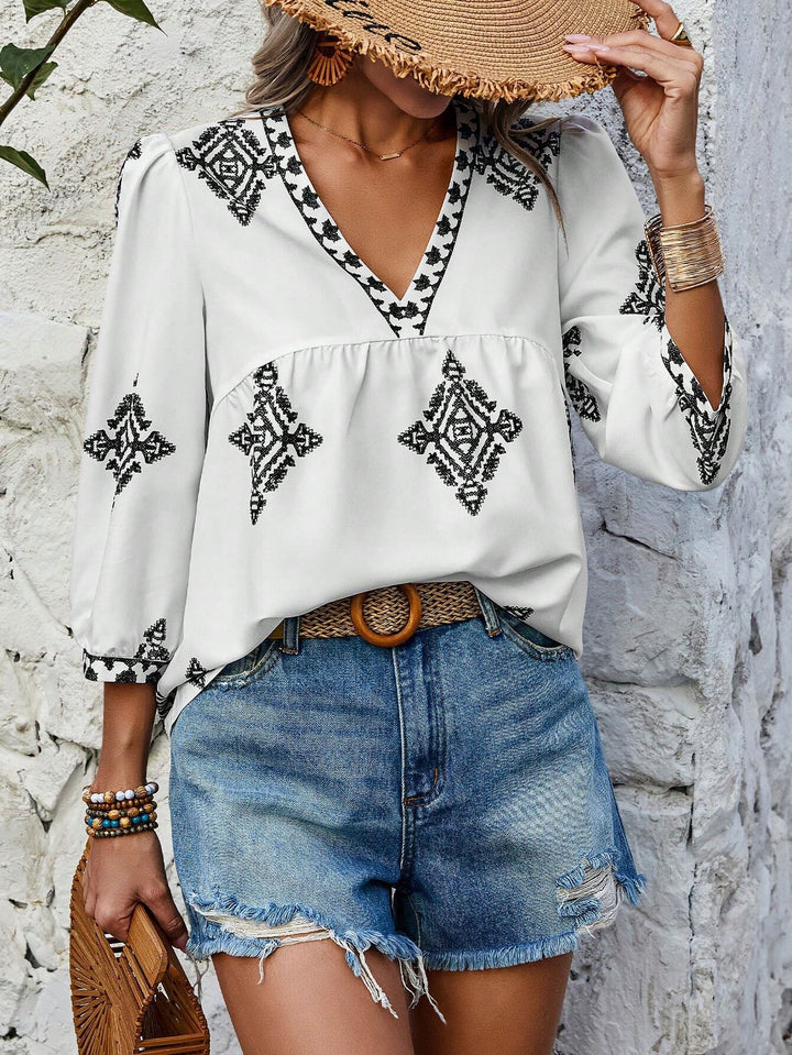 Damen Locker geschnittene Boho‑Bluse mit V‑Ausschnitt, geraffter Brustnaht und dreiviertelärmeln Echo Archiv