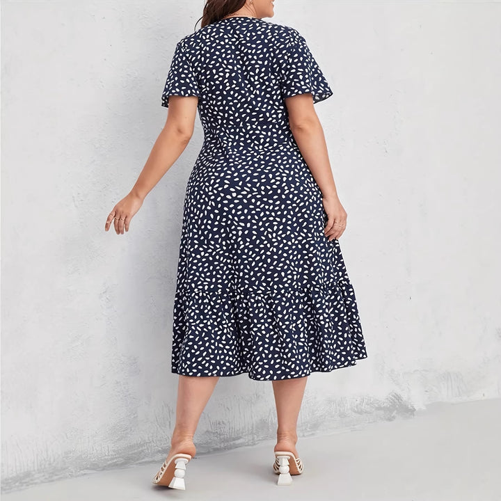 Damen Midi-Kleid mit fließendem Schnitt und verspieltem Muster Echo Archiv
