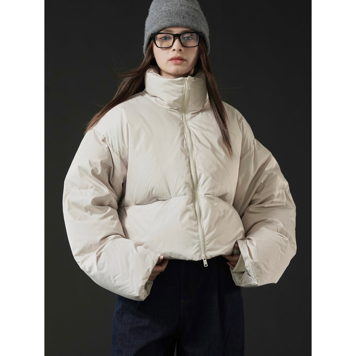 Damen Kurz geschnittene gesteppte Pufferjacke mit hohem Stehkragen und wärmeisolierender Füllung Echoarchiv