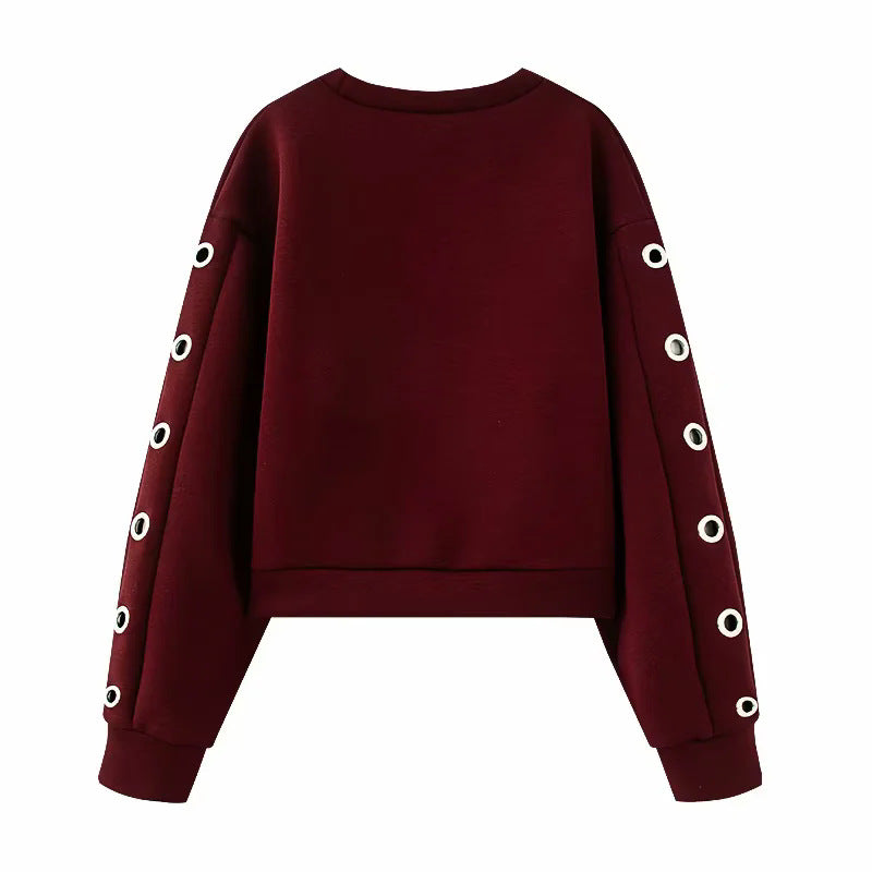 Damen kurzes Oversize Sweatshirt mit dekorativen Metallösen an den Ärmeln – Mavelle