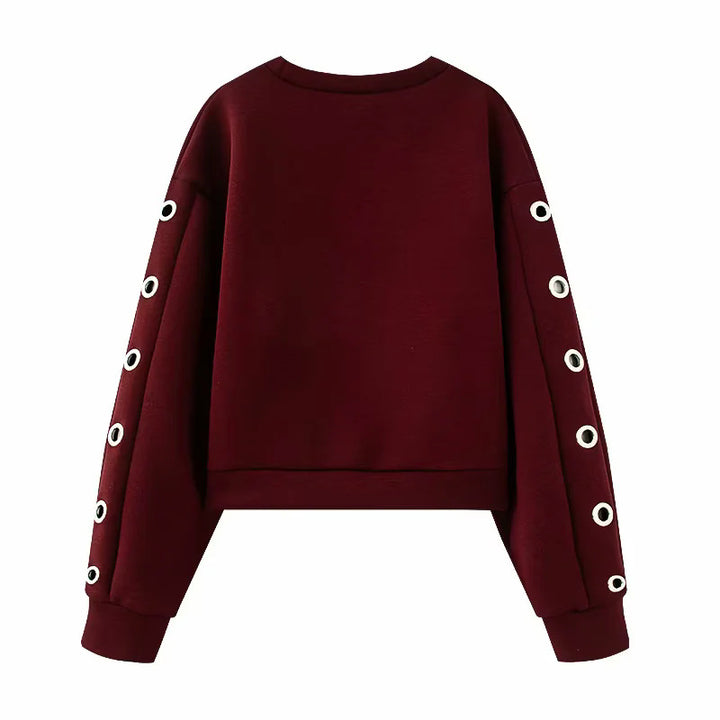 Damen kurzes Oversize Sweatshirt mit dekorativen Metallösen an den Ärmeln – Mavelle