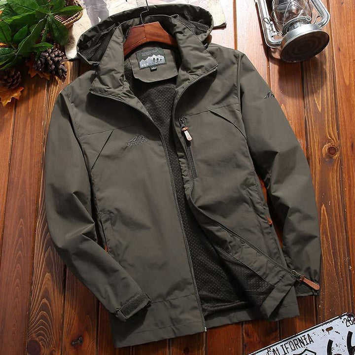 Herren Wasserabweisende Softshelljacke mit Fleece Innenfutter, Kapuze und Brusttasche Echo Archiv