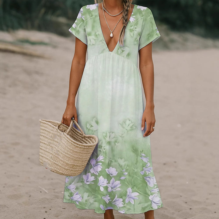 Damen Fließendes Maxi-Kleid mit tiefem V-Ausschnitt und floralem Muster Echo Archiv