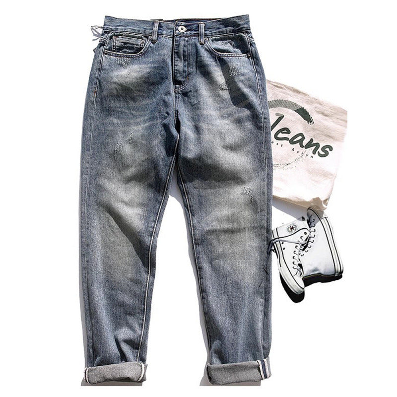 Herren Relaxed-Tapered Vintage-Jeans mit Used‑Effekt und aufgekrempeltem Saum Echoarchiv