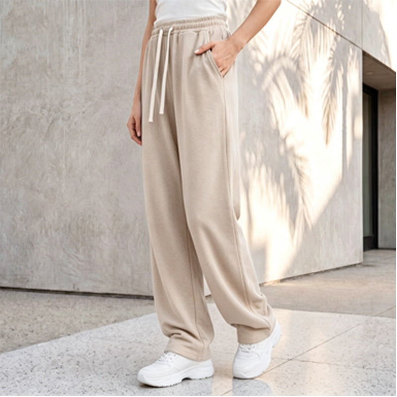 Damen nan weite Loungepalazzo-Hose mit hohem Komfortbund, Kordelzug, seitlichen Eingrifftaschen und dekorativer Seitennaht Echo Archiv