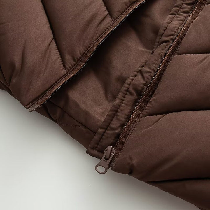 Damen Hybrid-Steppjacke mit Wattierung, Kapuze und elastischen Ärmel-Einsätzen Echoarchiv