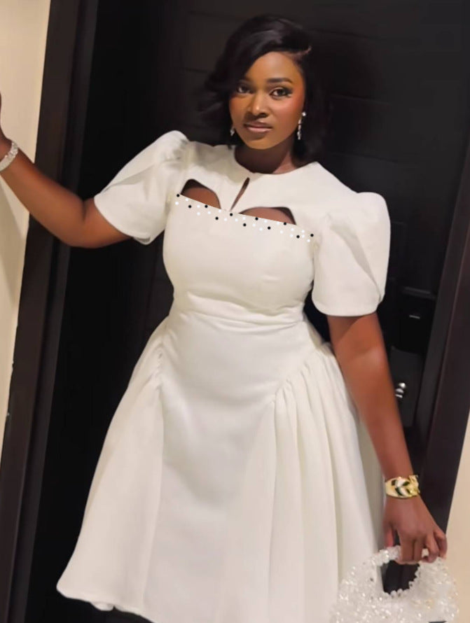 Damen Abendkleid mit voluminösen Puffärmeln und raffinierten Cut-Outs Echo Archiv