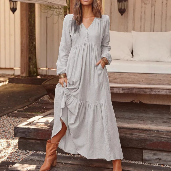 Damen nan luftiges Maxikleid mit V-Ausschnitt, langen Ärmeln und seitlichen Taschen Echo Archiv