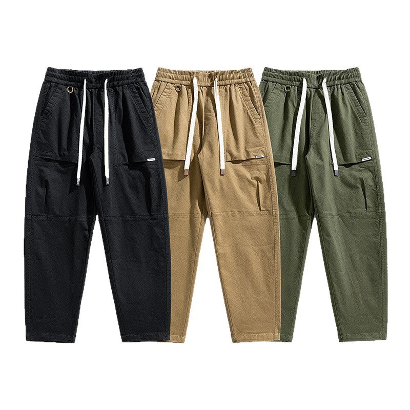 Herren Baggy-Utility-Cargohose im Tapered-Schnitt mit elastischem Tunnelzugbund, aufgesetzten Fronttaschen und Knieabnähern Echo Archiv