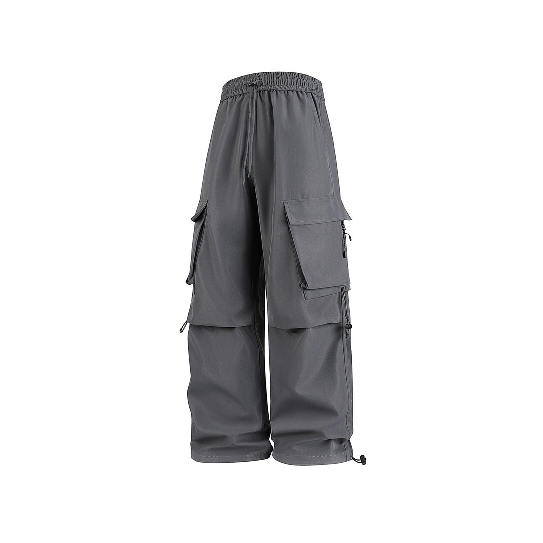 Herren Baggy‑Cargohose im Tech‑Utility‑Stil mit elastischem Tunnelzugbund, großen Klappfächern und Zipper‑Details Echo Archiv