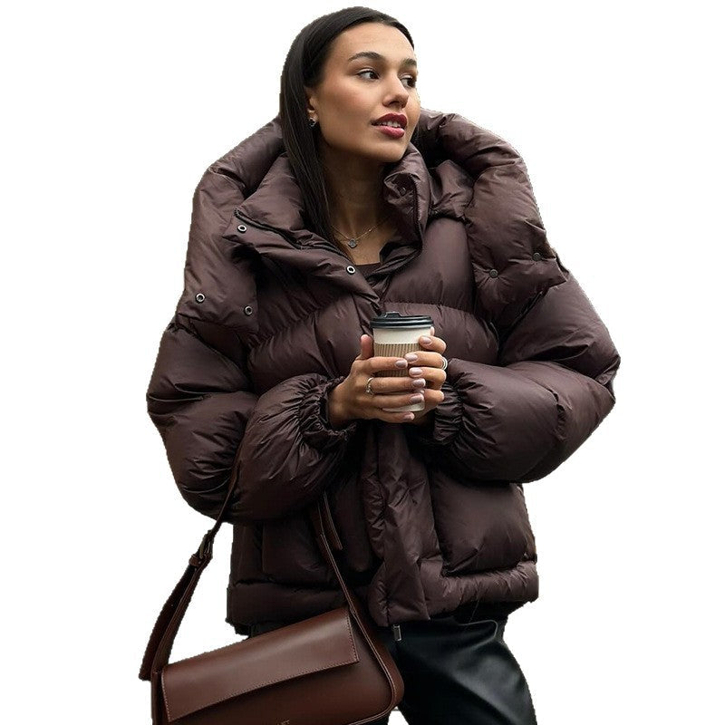 Echoarchiv | Damen Gesteppte Winterjacke mit Oversized Kapuze – Warm, Wasserabweisend & Modern