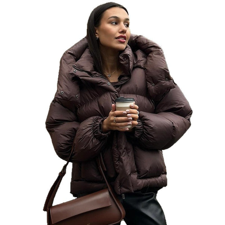 Echoarchiv | Damen Gesteppte Winterjacke mit Oversized Kapuze – Warm, Wasserabweisend & Modern