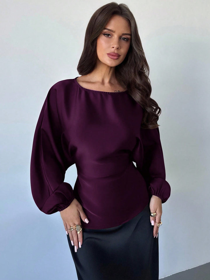 Damen Polka-Dot Satinbluse mit Ballonärmeln und weitem Rundhalsausschnitt – Élovi