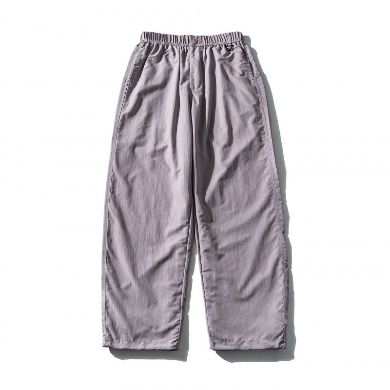 Unisex Weite Crinkle-Hose mit elastischem Tunnelzugbund, tiefem Schritt und Seitentaschen Echo Archiv