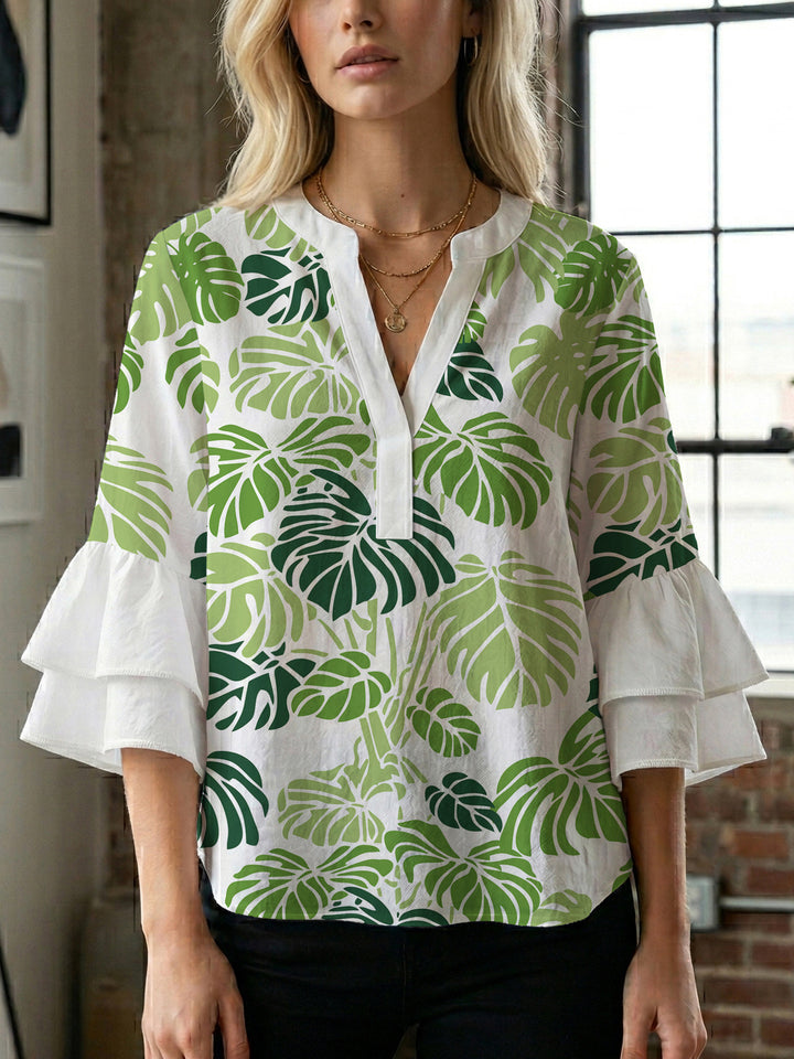 Damen Bluse mit voluminösen Flügelärmel und intensivem Blattmuster Echo Archiv