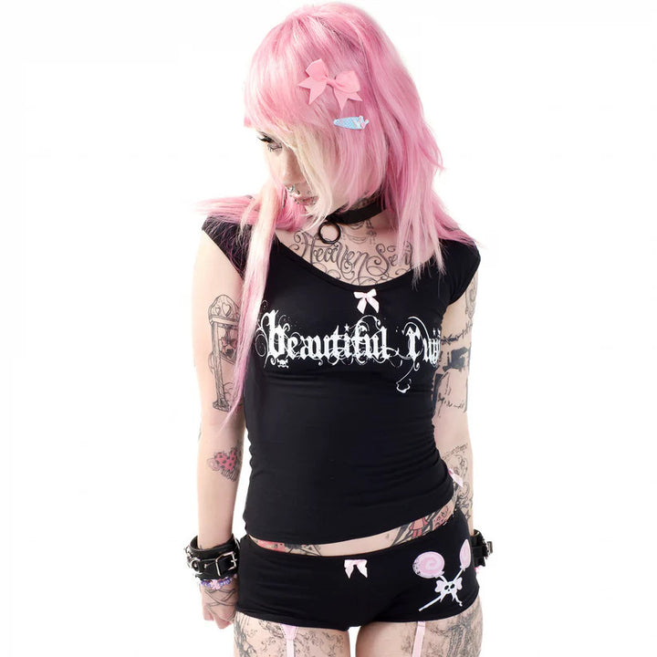 Damen Kurzarmshirt mit stilvollem Schriftzug und dekorativem Schleifenakzent Echo Archiv