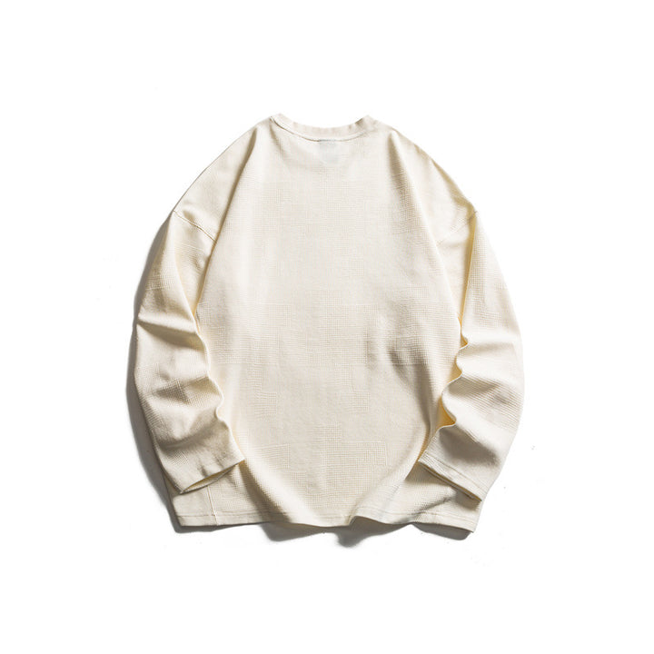 Unisex Grobstrukturierter Waffelstrick-Langarmpullover im Oversize-Schnitt mit Rundhals Echoarchiv
