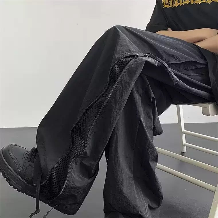Herren lässige Cargo-Hose mit atmungsaktiven Netzdetails und funktionalen Reißverschlüssen Echoarchiv