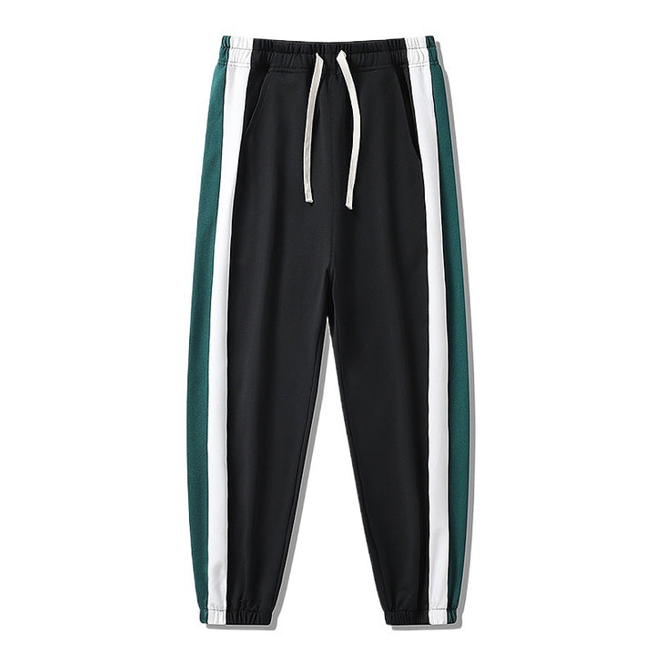 Herren Konische Trackhose mit Kordelzug, seitlichen Colorblock‑Streifen & elastischen Bündchen Echoarchiv