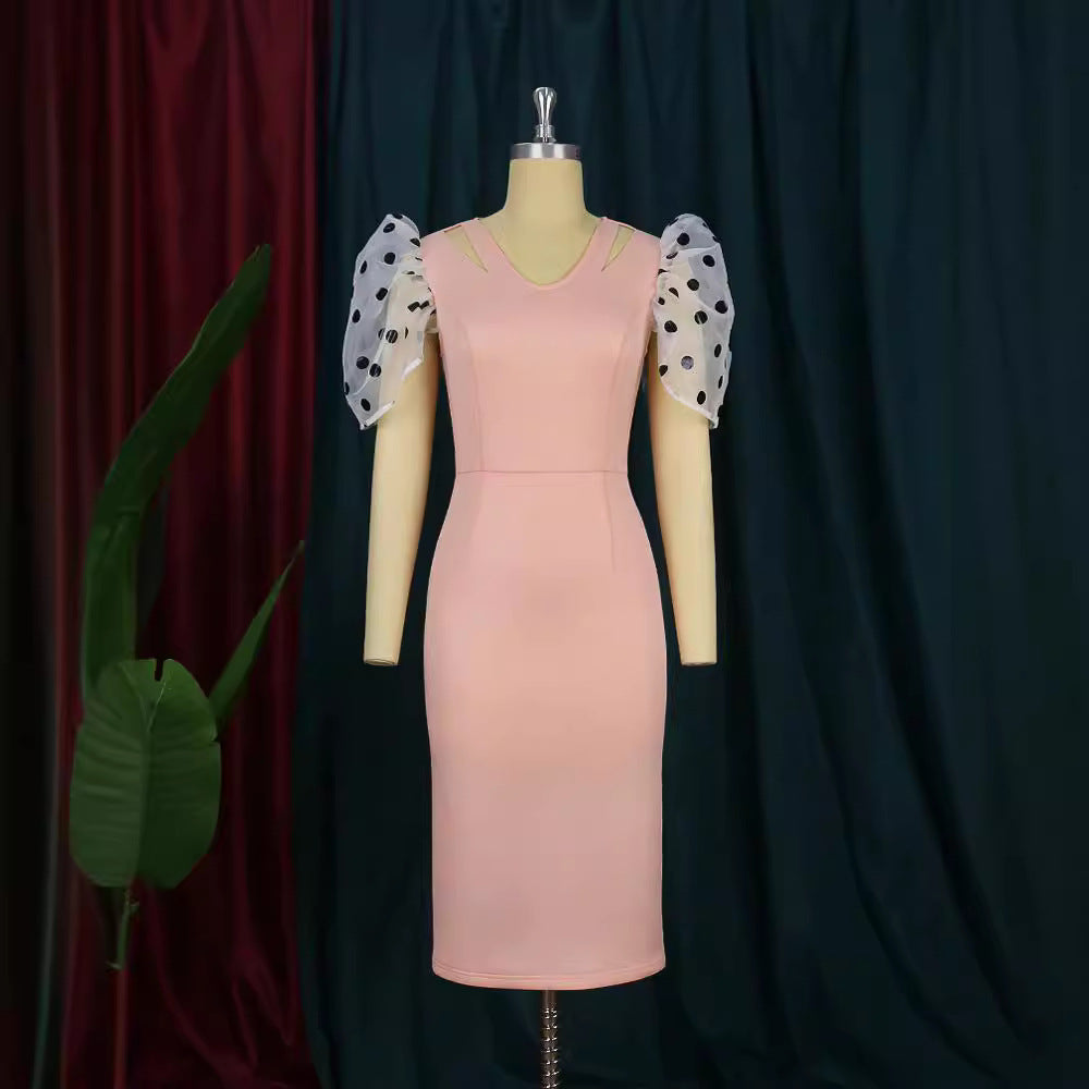 Damen Figurbetontes Kleid mit transparenten Puffärmeln Echo Archiv