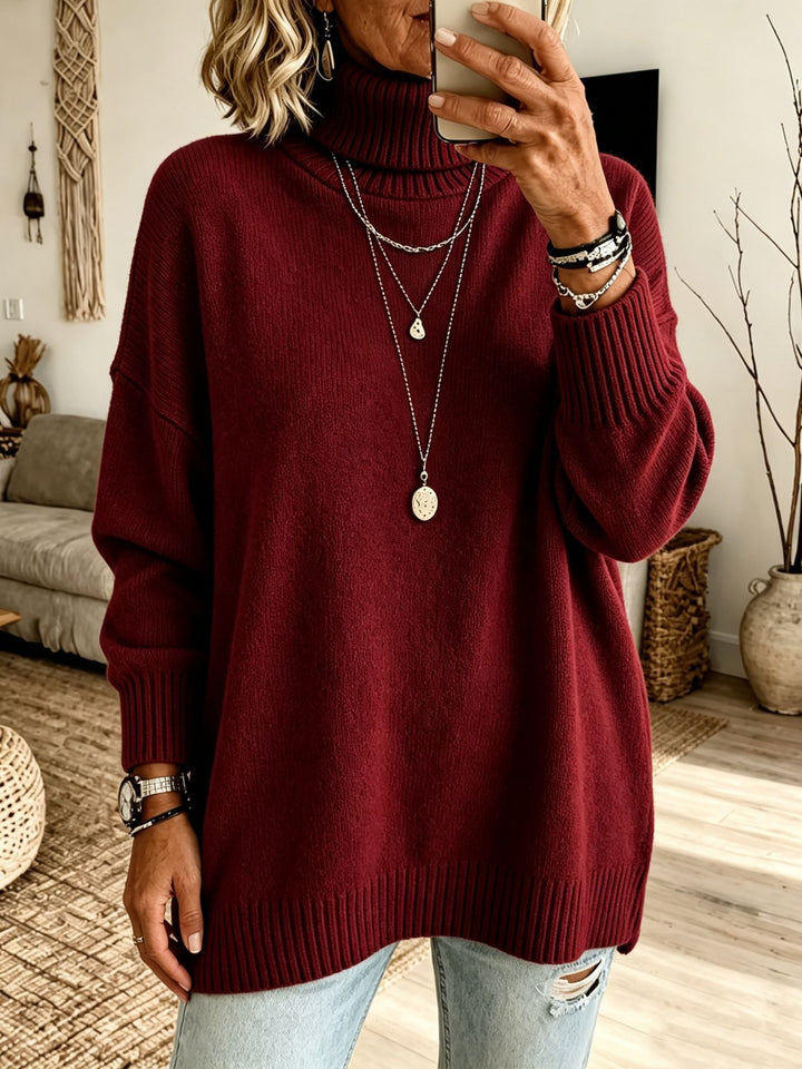Damen Oversize Rollkragenpullover aus Feinstrick mit gerippten Bündchen und überschnittener Schulter – Mavelle