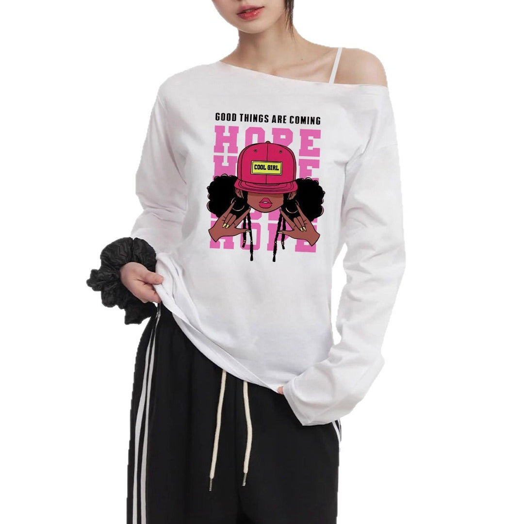 Damen lässiges Off-Shoulder Langarmshirt mit großflächigem Cartoon-Grafikprint und elastischem Baumwollmix – Avérine