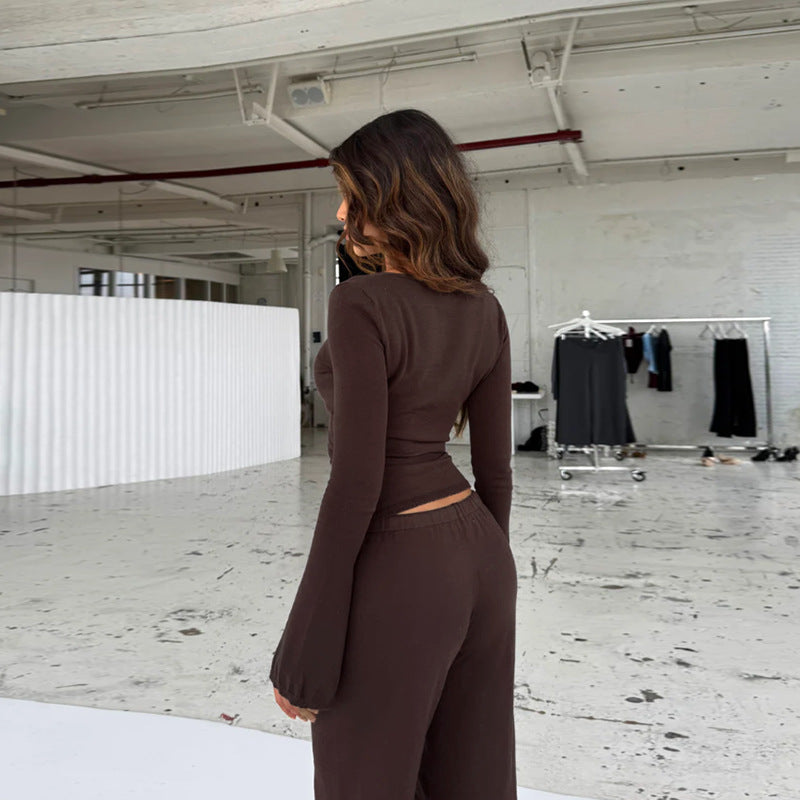 Damen lockerer Jumpsuit mit Wickeldesign und langen Ärmeln Echo Archiv
