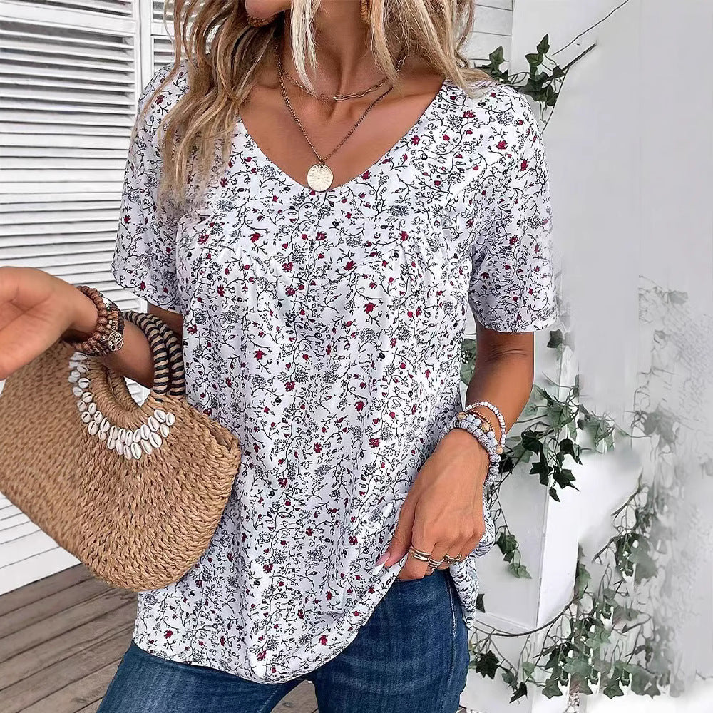 Damen nan lässiges Kurzarm-Tunika-Shirt mit Rundhalsausschnitt, zartem Blumenallover und dekorativen Brustfalten Echo Archiv