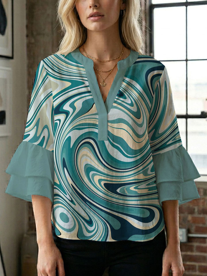 Damen Blusenshirt mit voluminösen Ärmeln und kreativem Druckdesign Echo Archiv