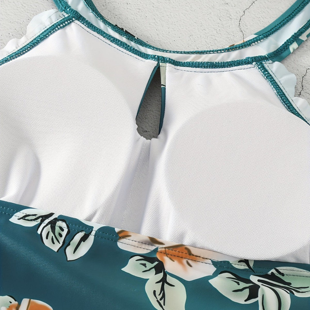 Damen Einteiliger Badeanzug mit elegantem Schnitt und floralem Design Echo Archiv