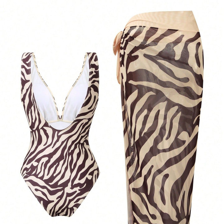 Damen Eleganter Strandmode-Anzug mit tiefem V-Ausschnitt und Gürtel Echo Archiv