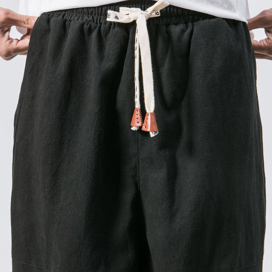 Herren nan relaxed Fit Leinen-Jogger mit Tunnelzug, eingesetzten Knieteilen und elastischen Bündchen Echo Archiv