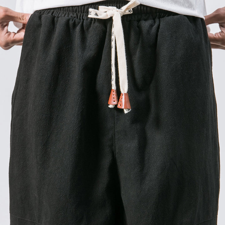 Herren nan relaxed Fit Leinen-Jogger mit Tunnelzug, eingesetzten Knieteilen und elastischen Bündchen Echo Archiv