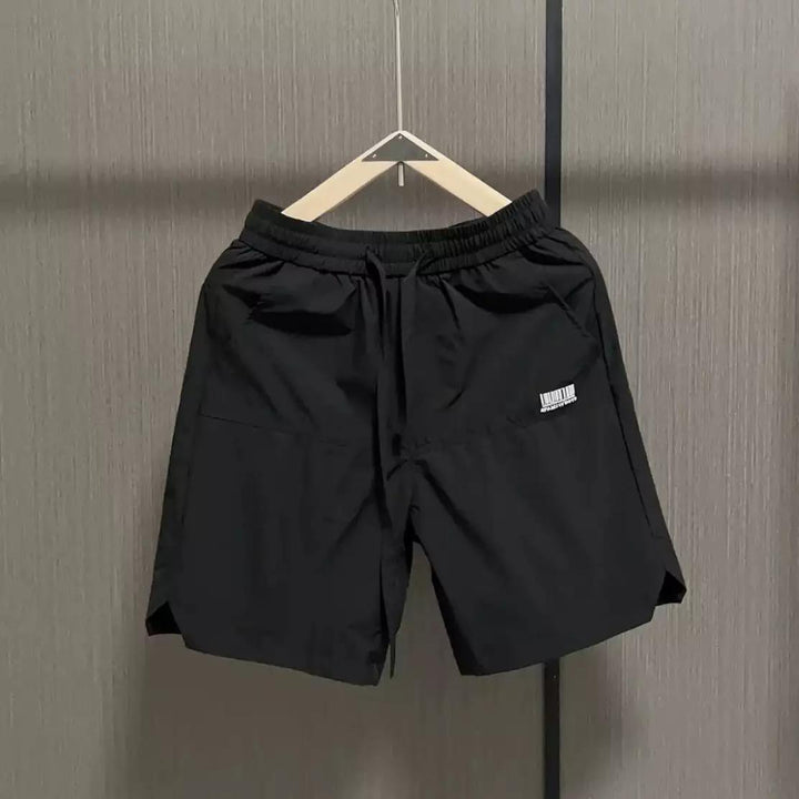 Herren lässige Sportshorts mit elastischem Bund und seitlichen Eingrifftaschen Echoarchiv