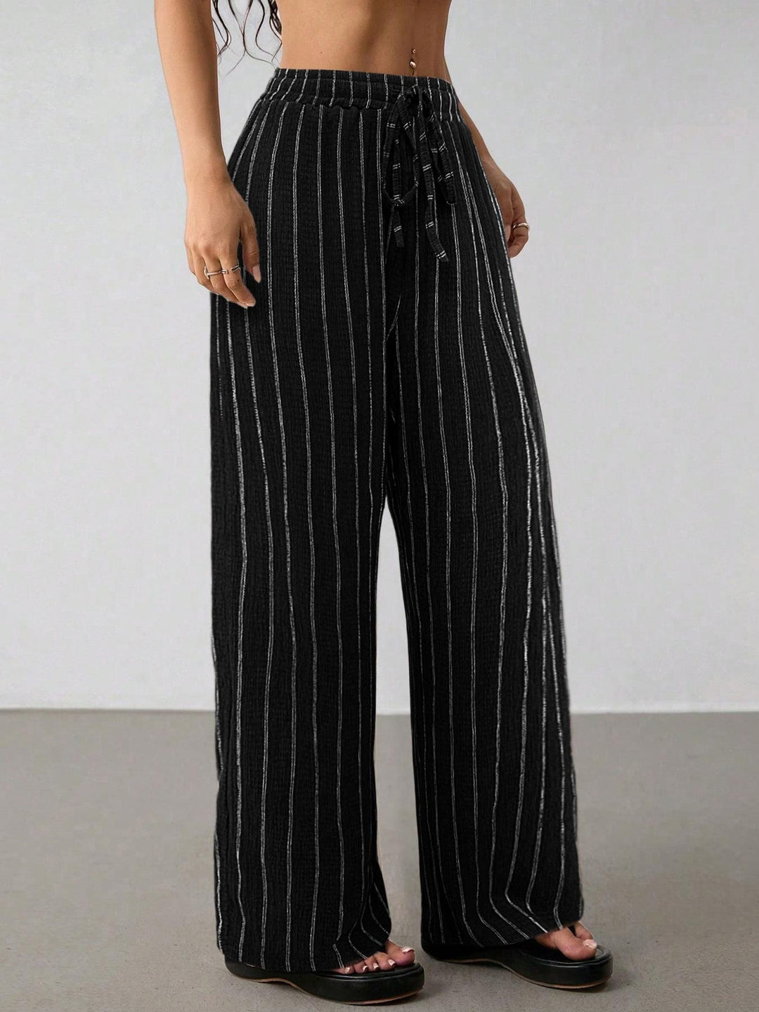 Damen Weite Strickhose mit hohem Bund und Kordelzug Echo Archiv