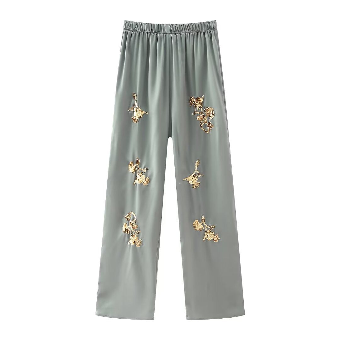 Damen weite Satinhose mit elastischem Bund und goldenen Paillettenblüten – Avélisse