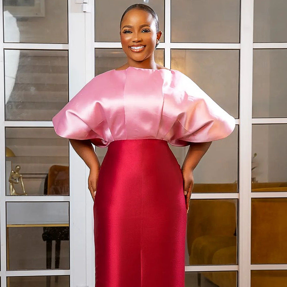 Damen Abendkleid mit voluminösen Puffärmeln und figurbetonter Silhouette Echo Archiv
