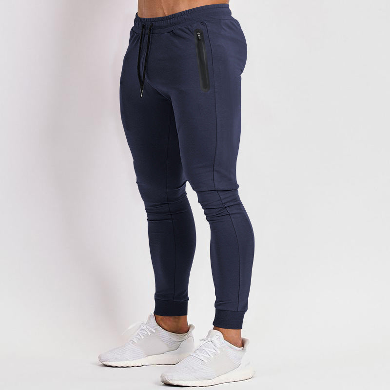 Herren schmal geschnittene Jogginghose mit Reißverschlusstaschen und Kordelzug Echoarchiv