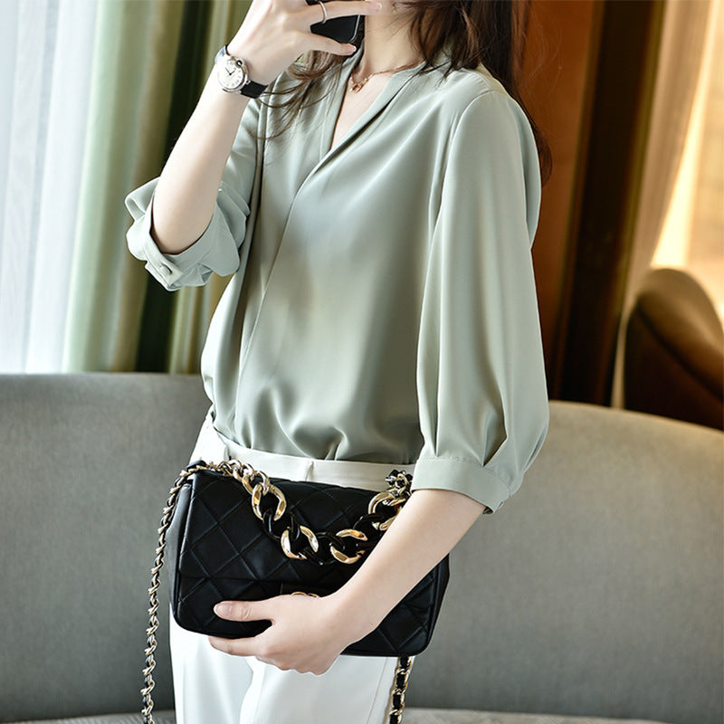Damen Elegante Bluse mit Ballonärmeln Echoarchiv