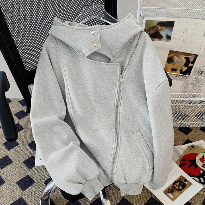 Damen Oversized Kapuzenjacke mit asymmetrischem Reißverschluss und Cut-Out-Detail – Avérine