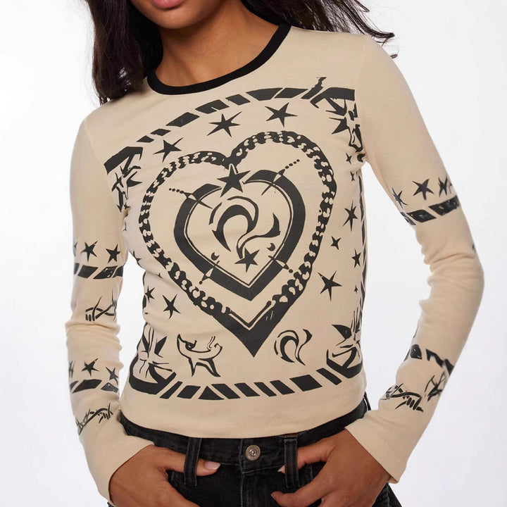 Damen Cropped-Langarmshirt mit figurbetontem Schnitt und Allover-Herzprint – Avérine