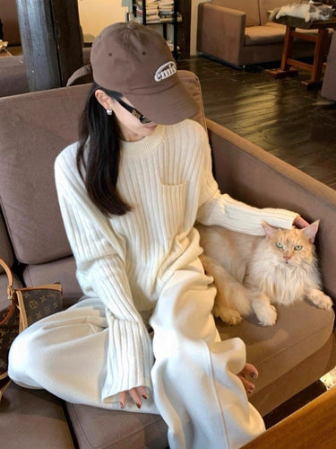 Damen Oversize-Rippenstrickpullover mit Brusttasche und Mockneck Echoarchiv