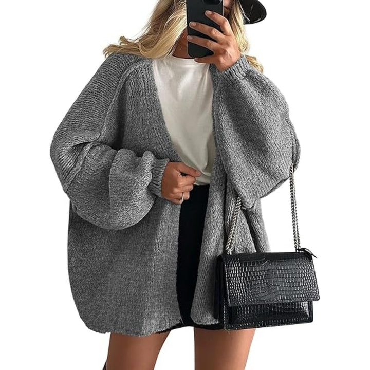 Damen Oversize Strickcardigan mit Ballonärmeln und offener Front Echoarchiv