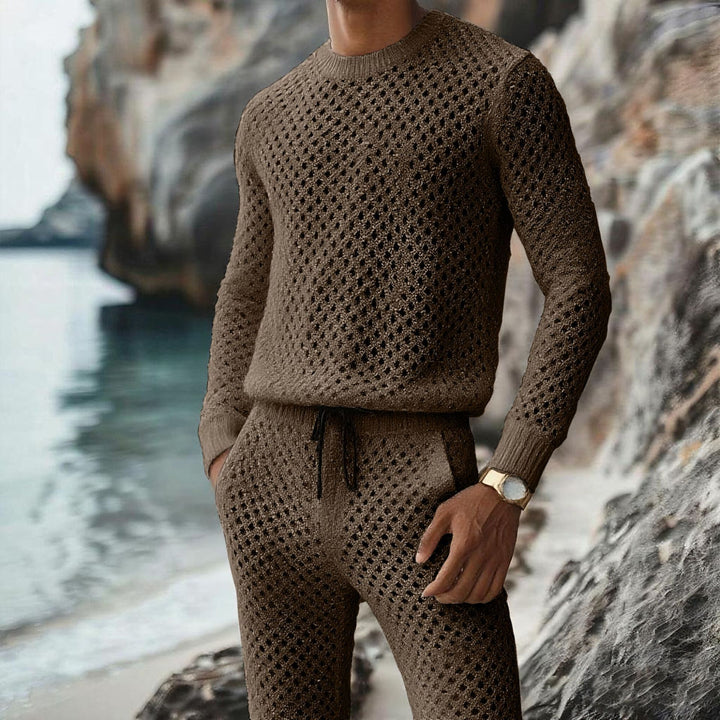 Herren Strukturstrick-Pullover mit feinmaschigem Lochmuster und Rundhals Echoarchiv