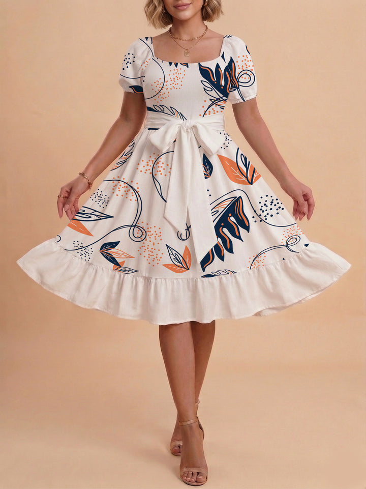 Damen Sommerliches Blumenkleid mit taillierbarem Gürtel und voluminösen Ärmeln Echo Archiv